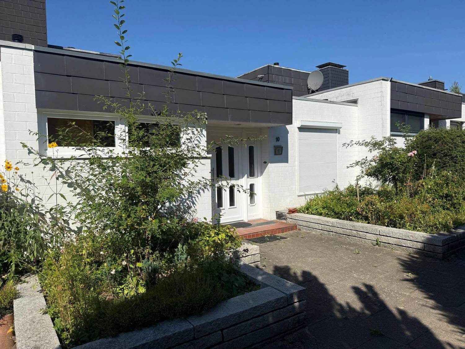 Abel & Baghai Immobilien – Reihenmittelhaus mit Loggia, Wintergarten und Sauna in Bad Oldesloe